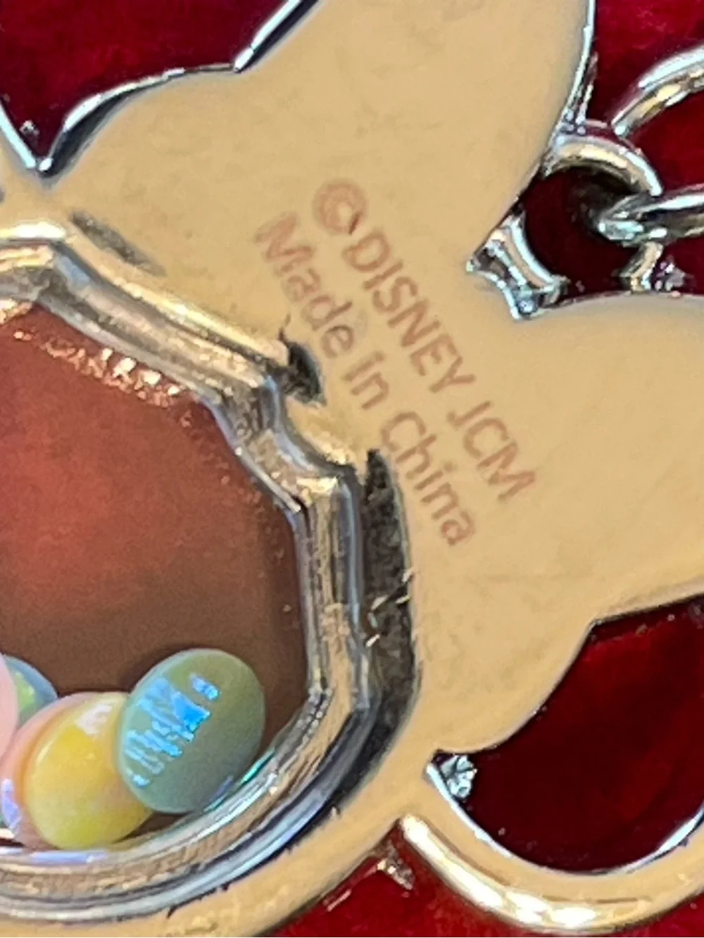 Minnie Mouse shaker charm on silver chain.